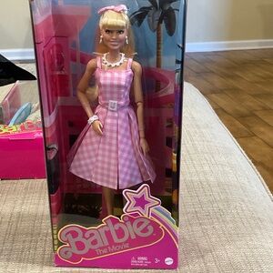 New Unopened Barbie The Movie Doll in Pink and White Checkered Dress.